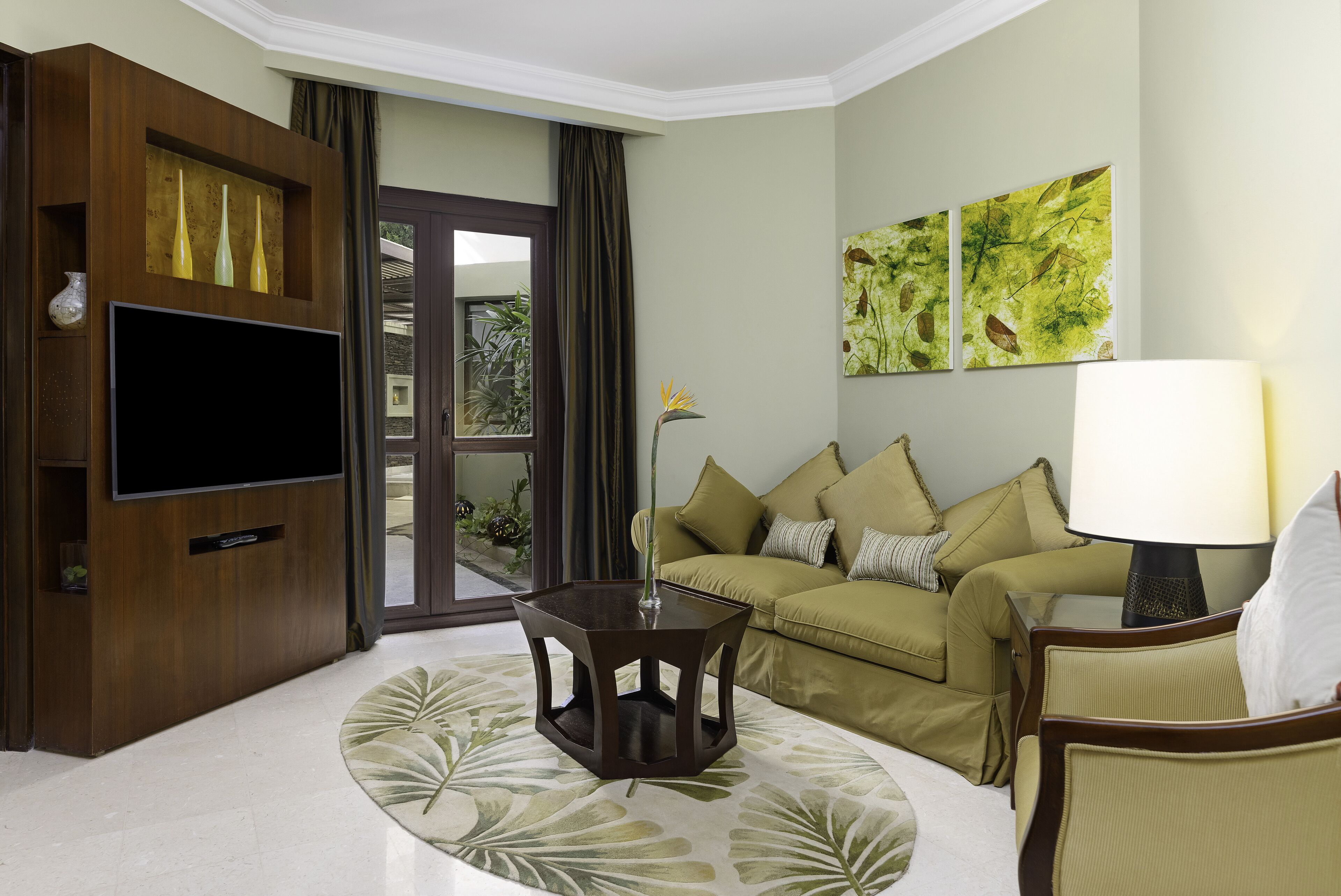 suite (spa) | living area | 49-inch smart tv with digital channels, tv