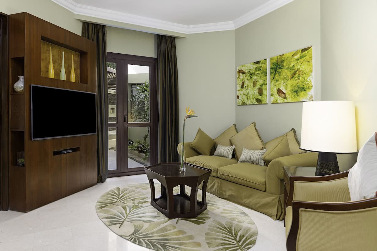 suite (spa) | living area | 49-inch smart tv with digital channels, tv