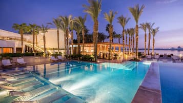 2 outdoor pools, open 9:00 AM to 10:00 PM, pool umbrellas, pool loungers