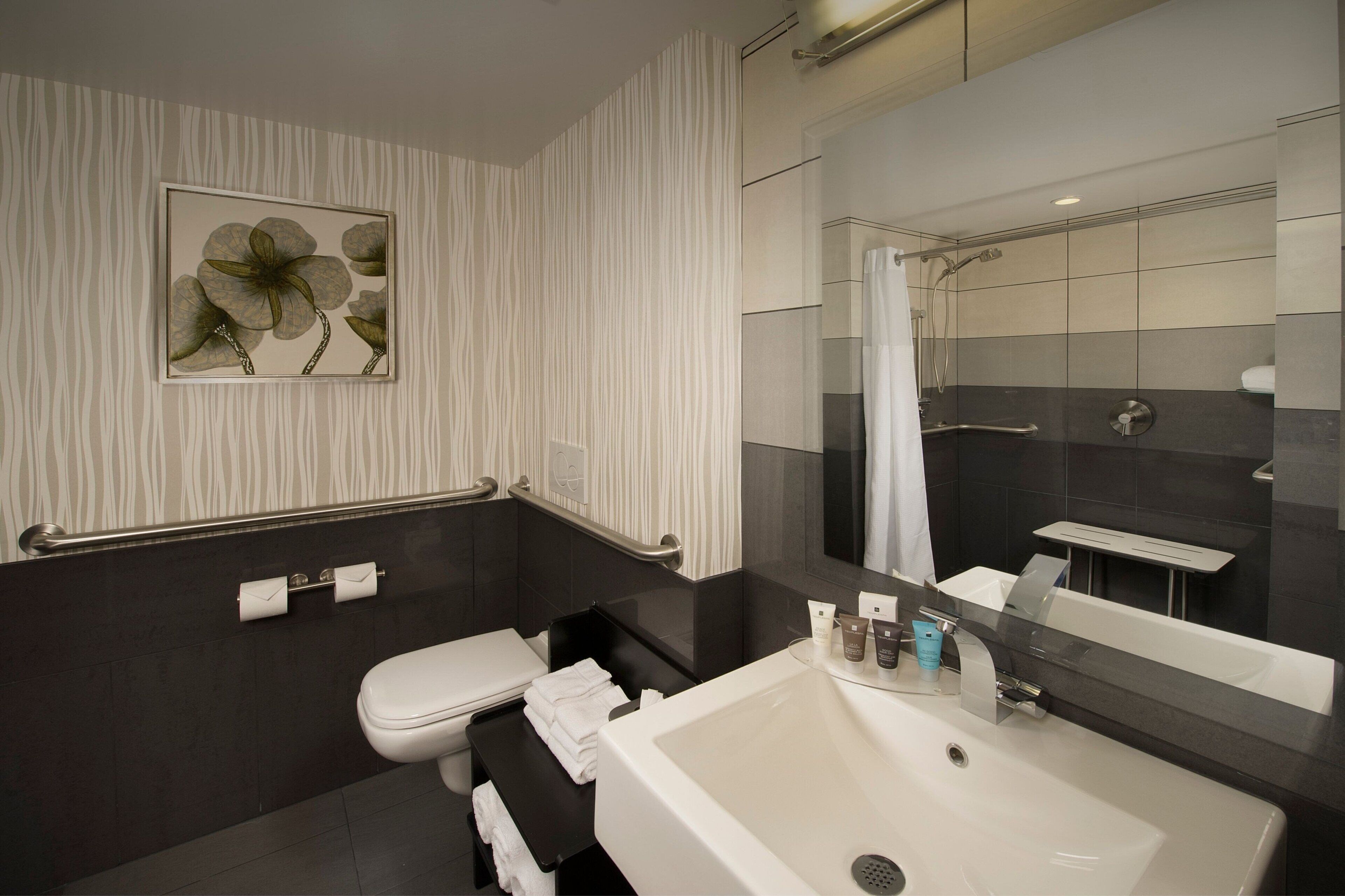 shower, free toiletries, hair dryer, towels