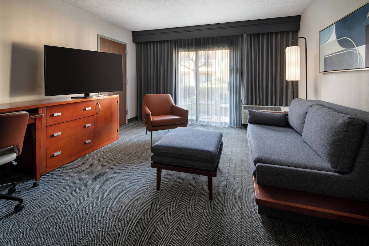Suite, 1 Bedroom, Non Smoking | Living area | LCD TV, pay movies