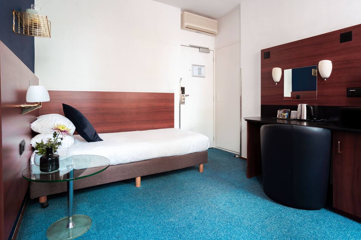 In-room safe, desk, blackout curtains, iron/ironing board (on request)