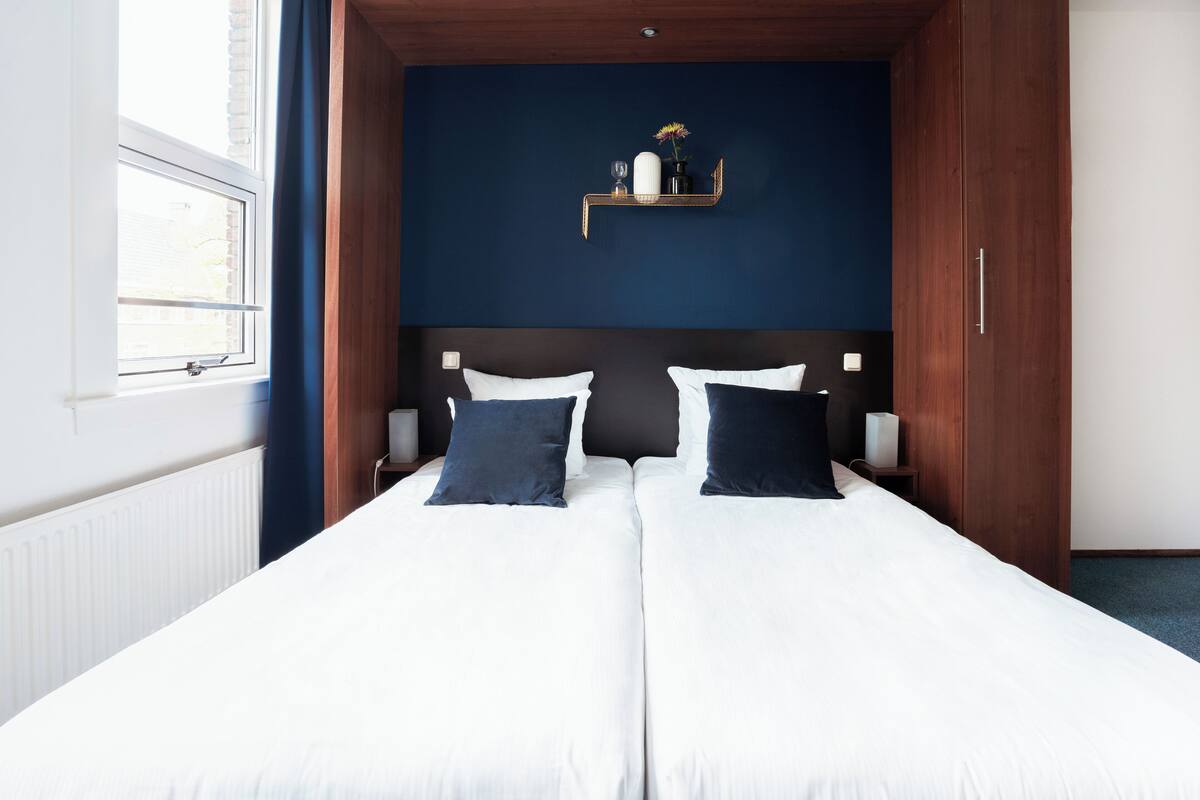 In-room safe, desk, blackout curtains, iron/ironing board (on request)