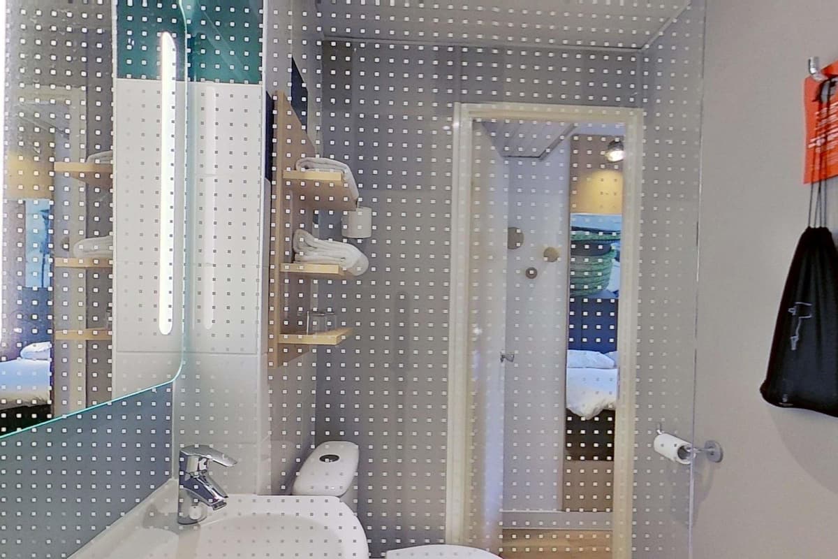 Premium bedding, desk, free WiFi, bed sheets