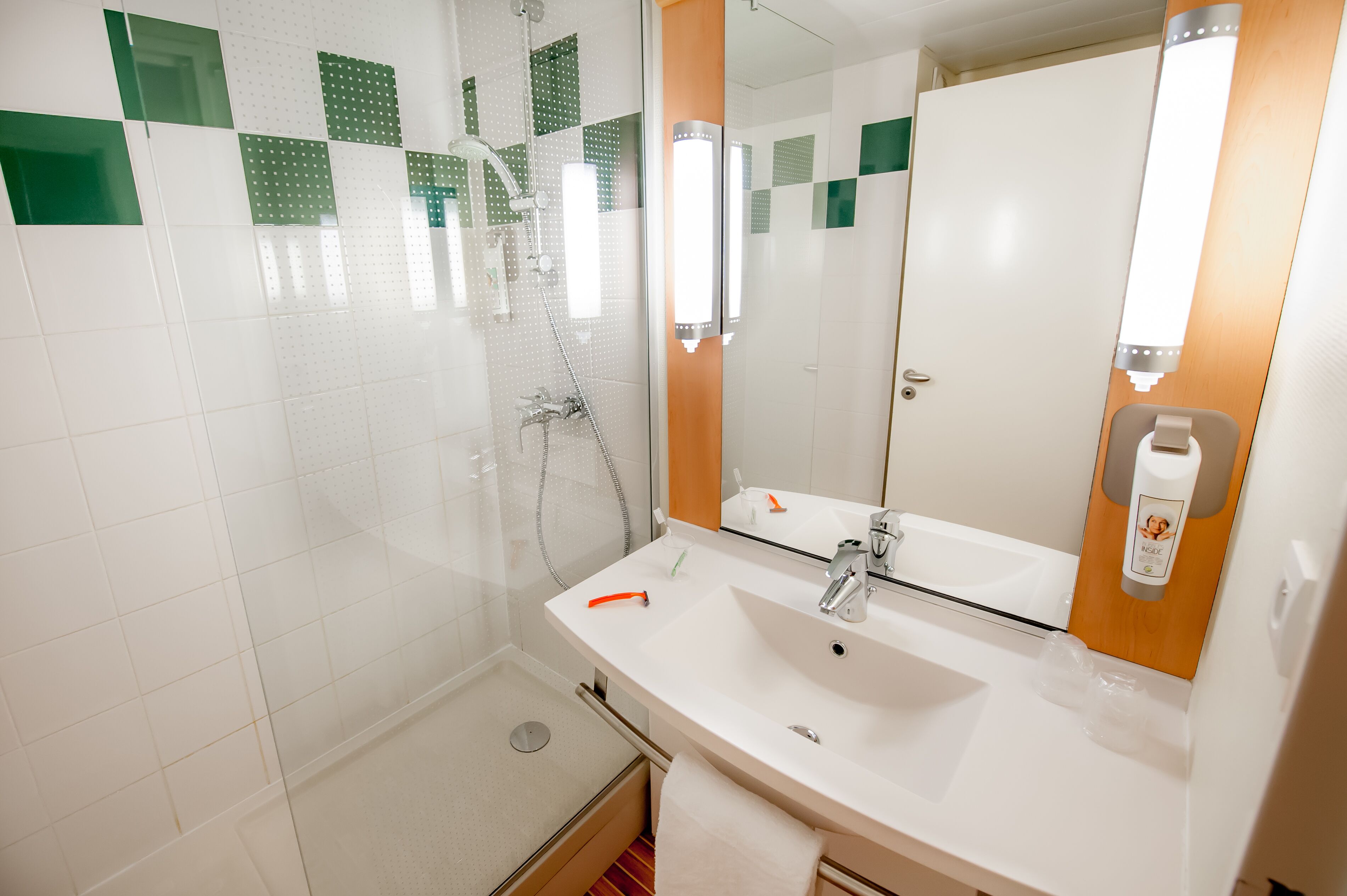 standard room, multiple beds | bathroom | shower, eco-friendly toiletries, hair dryer, towels