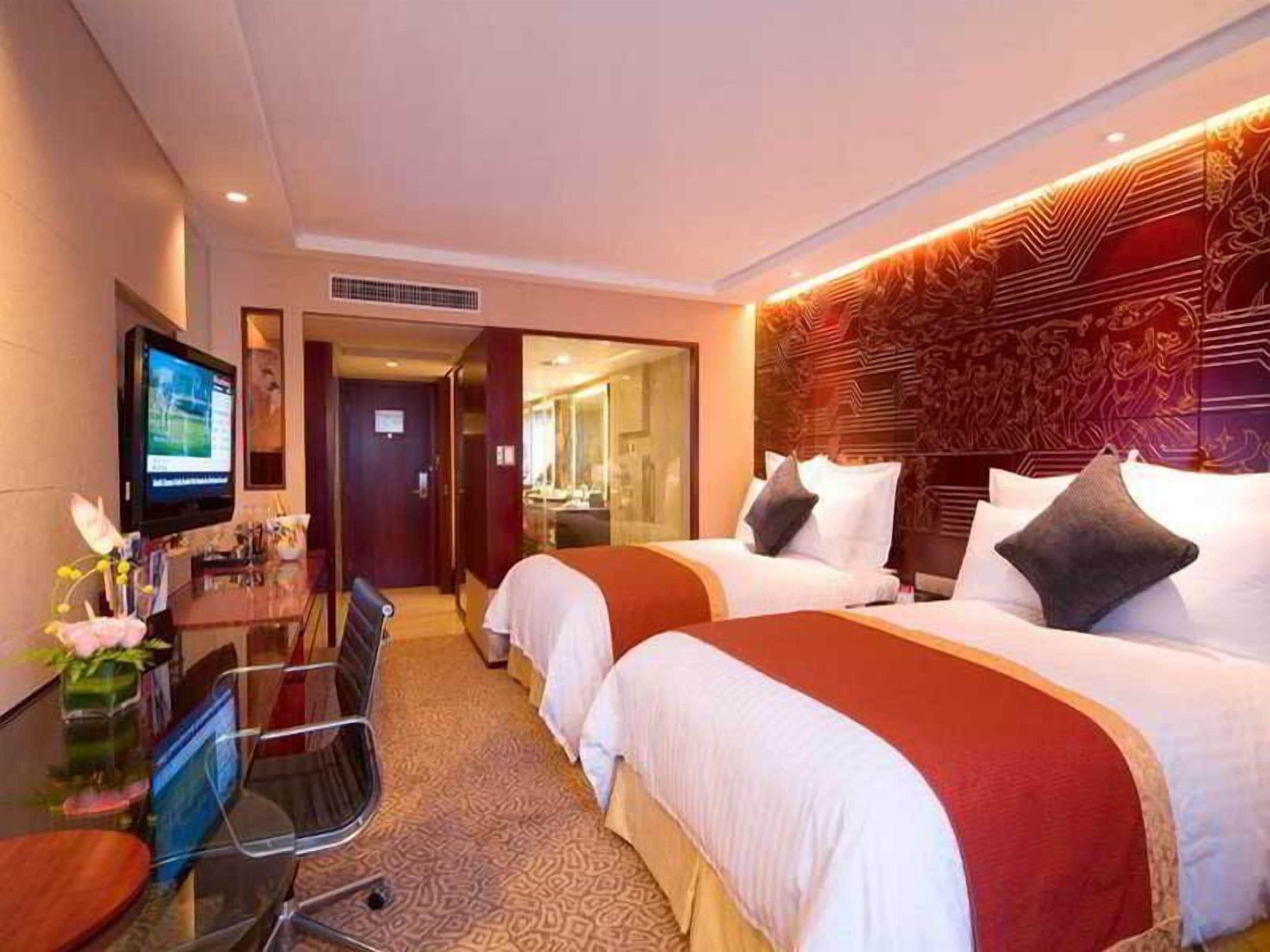 Premium bedding, minibar (some free items), in-room safe, desk