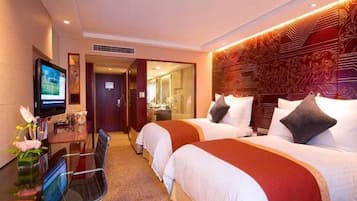 Premium bedding, minibar (some free items), in-room safe, desk