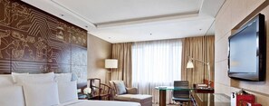 Premium bedding, free minibar items, in-room safe, desk
