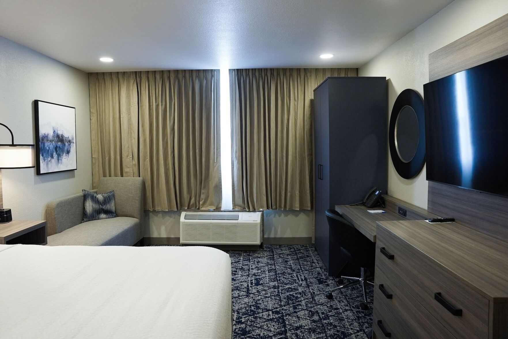 Desk, laptop workspace, blackout curtains, iron/ironing board