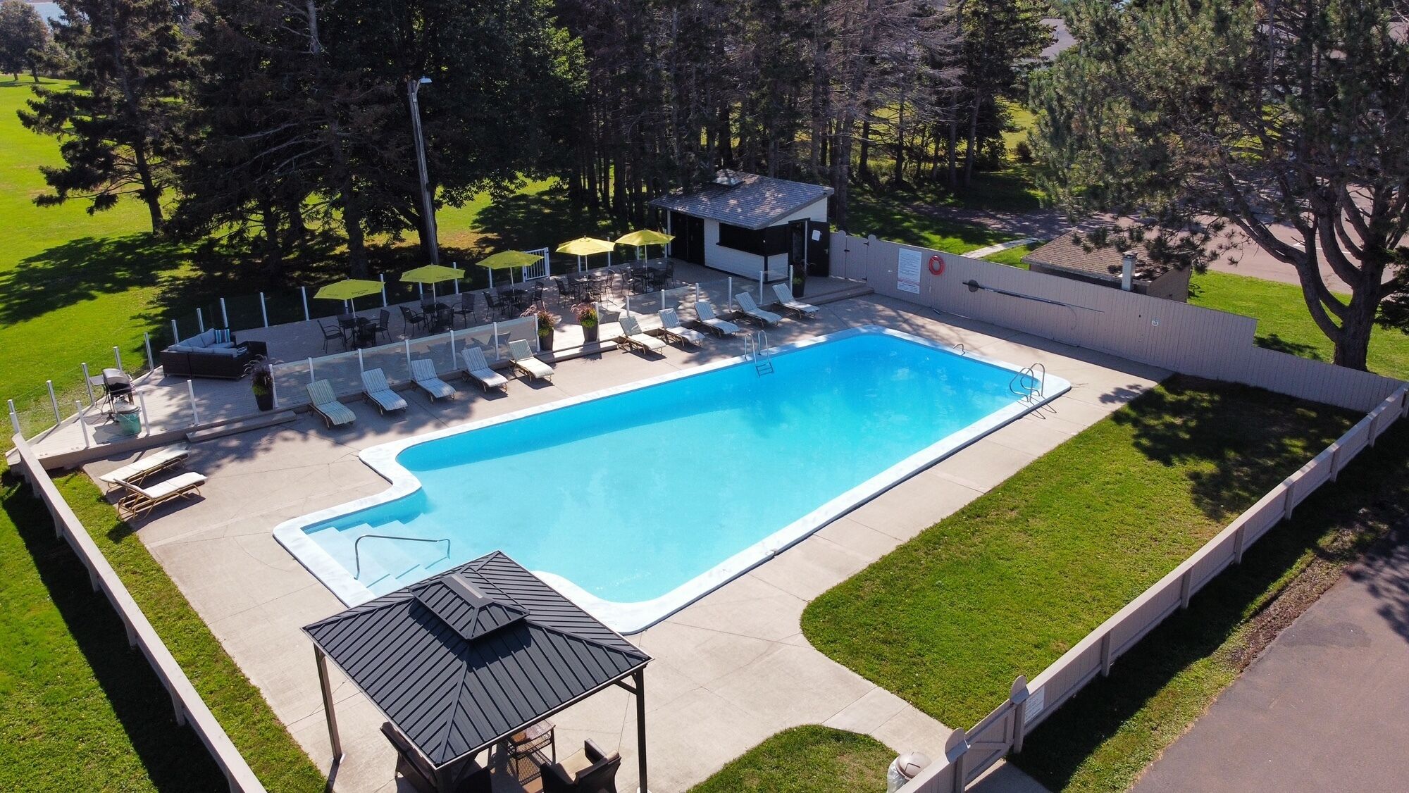 seasonal outdoor pool, pool umbrellas, pool loungers