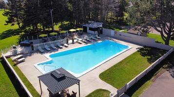 Seasonal outdoor pool, pool umbrellas, pool loungers