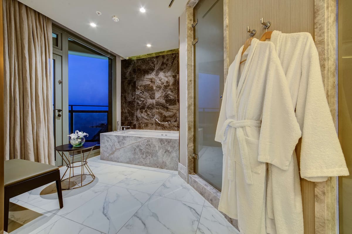 presidential suite | bathroom | deep-soaking bathtub, free toiletries, hair dryer, towels