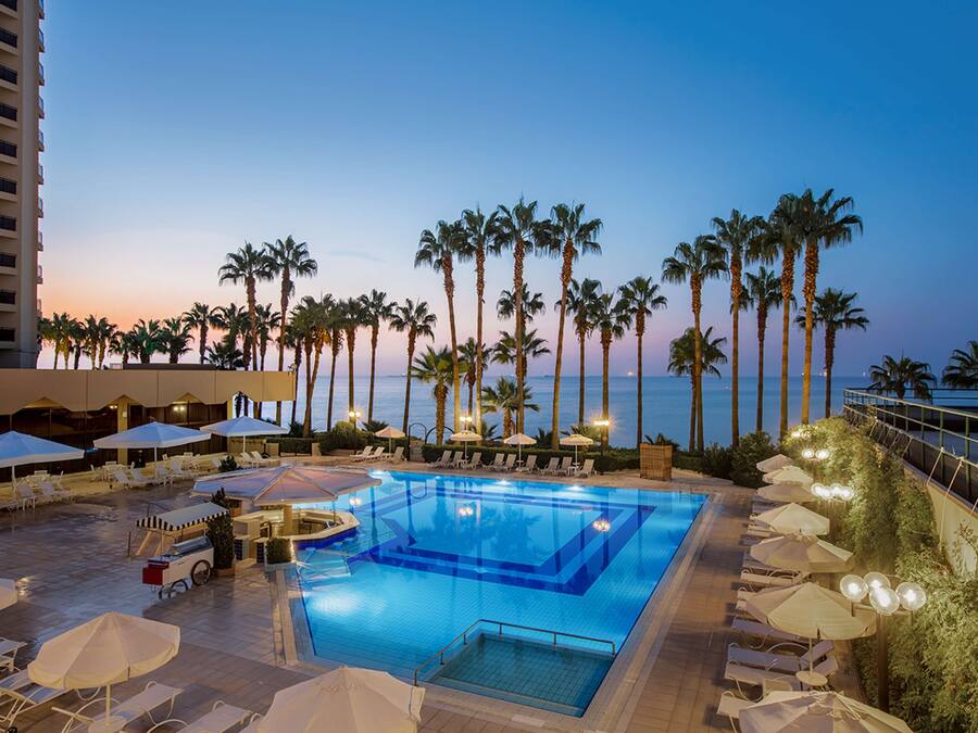 Seasonal outdoor pool, pool umbrellas, pool loungers