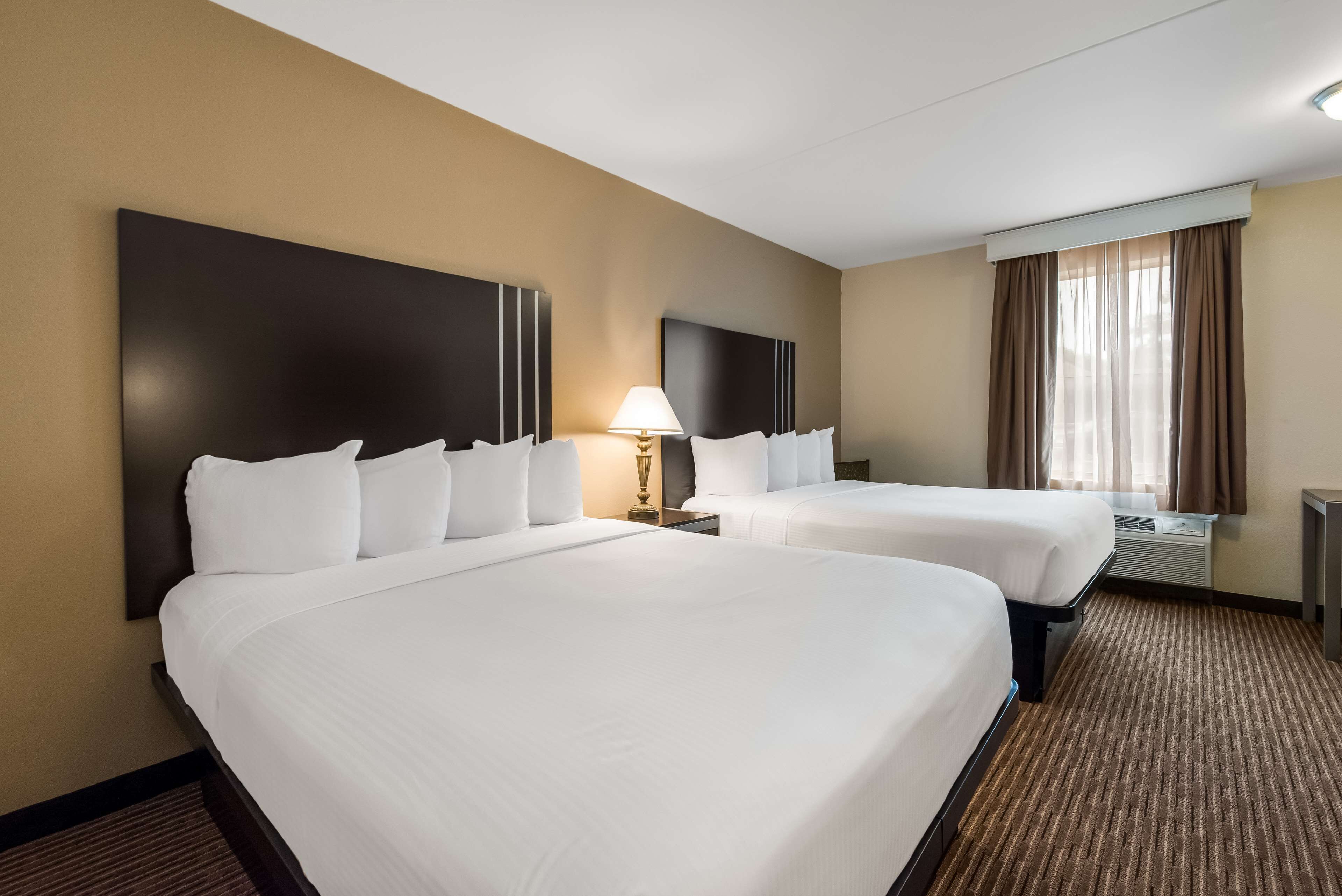 standard room, 2 double beds, non smoking, refrigerator & microwave | in-room safe, laptop workspace, iron/ironing board