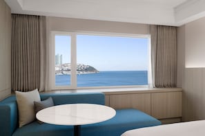 Premium bedding, down comforters, pillowtop beds, minibar