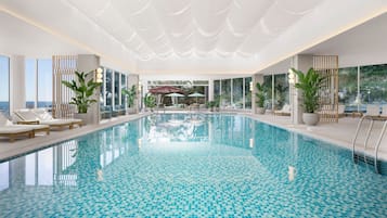 Indoor pool, open 6:00 AM to 10:00 PM, pool loungers