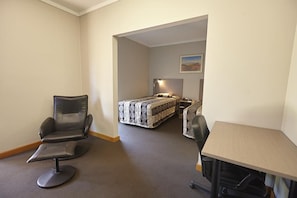 Business Twin Room, 1 Bedroom, Ground Floor | Desk, iron/ironing board, free WiFi, bed sheets