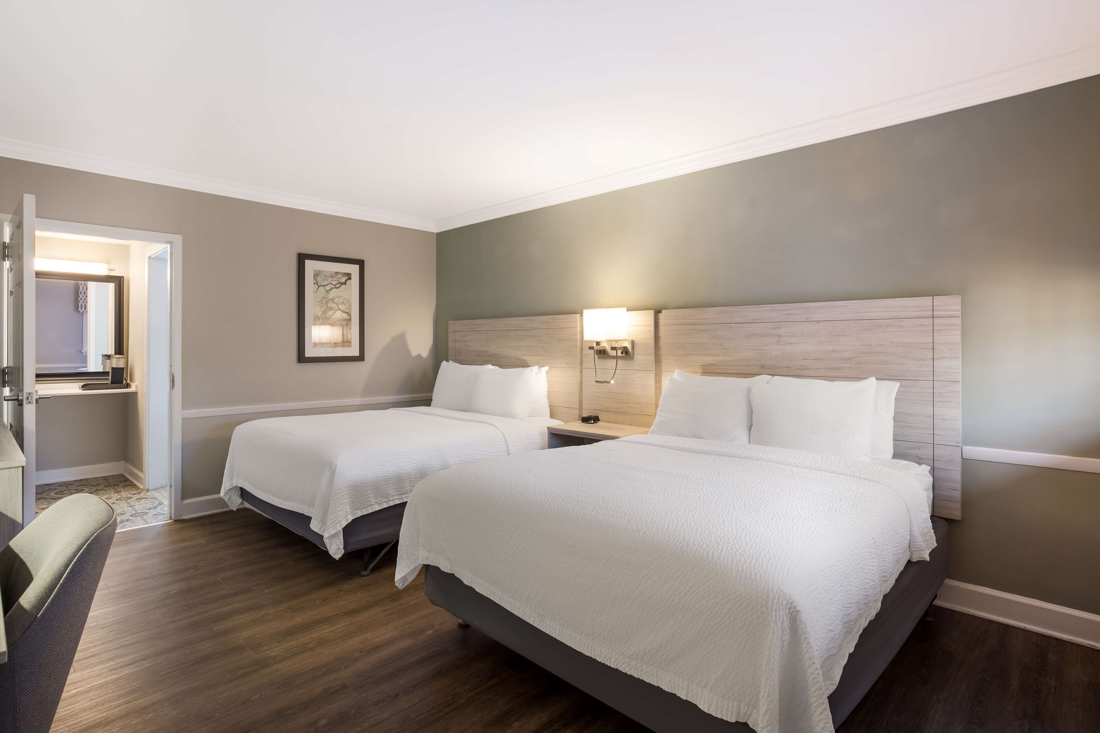 premium bedding, desk, laptop workspace, blackout curtains