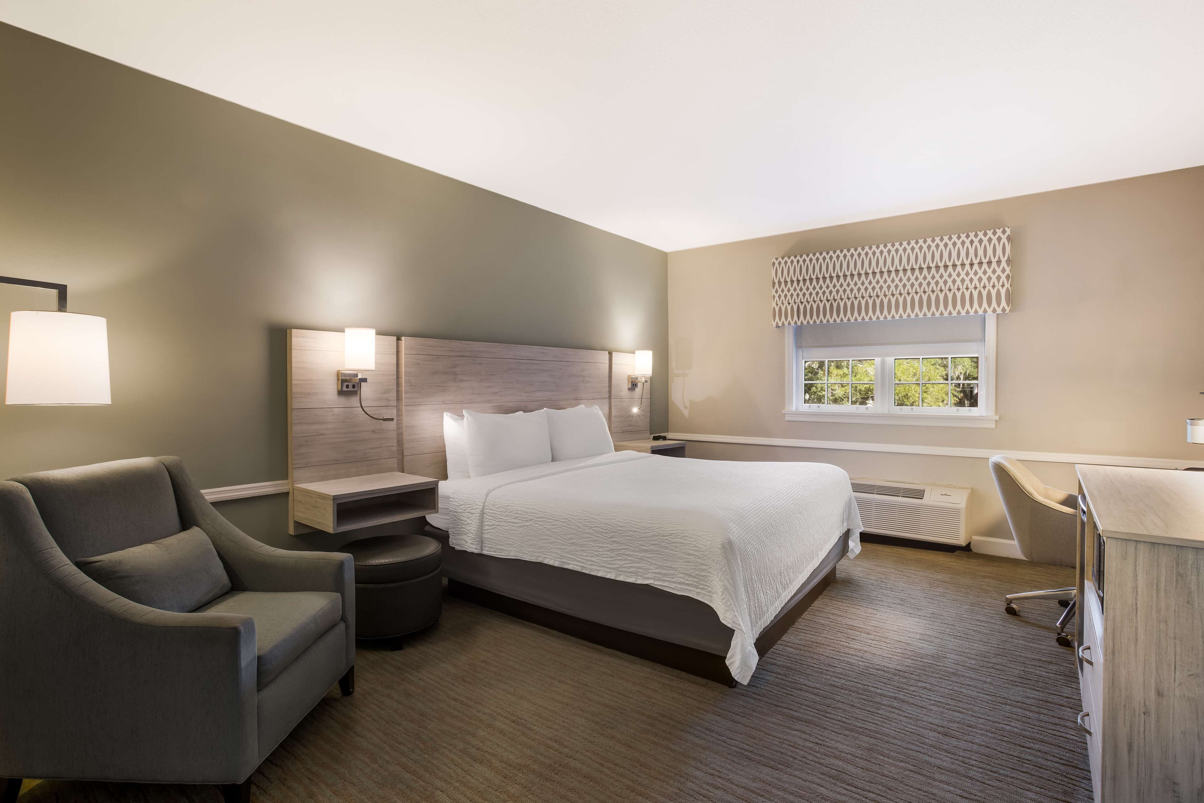 premium bedding, desk, laptop workspace, blackout curtains