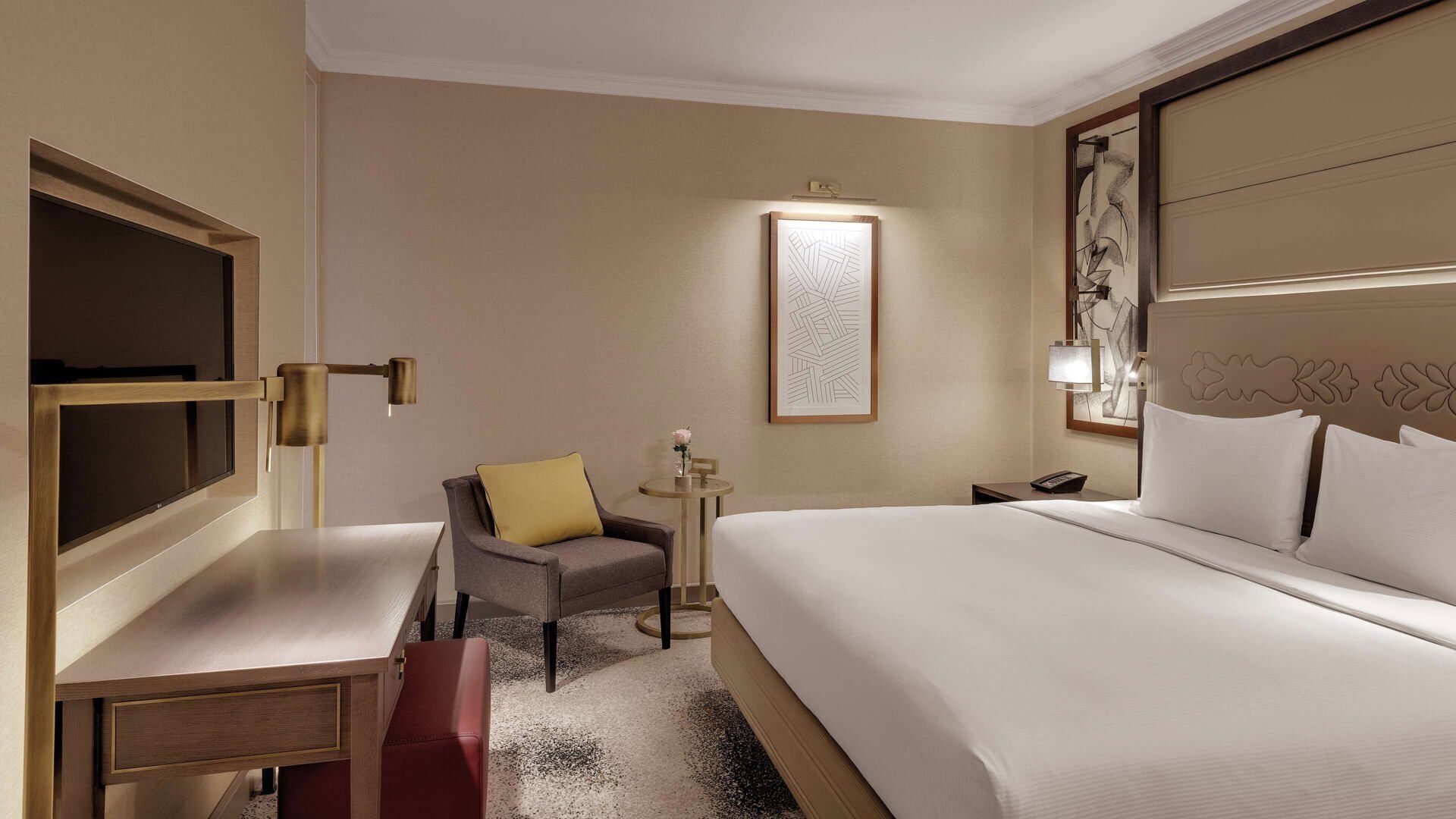 Hypo-allergenic bedding, in-room safe, laptop workspace