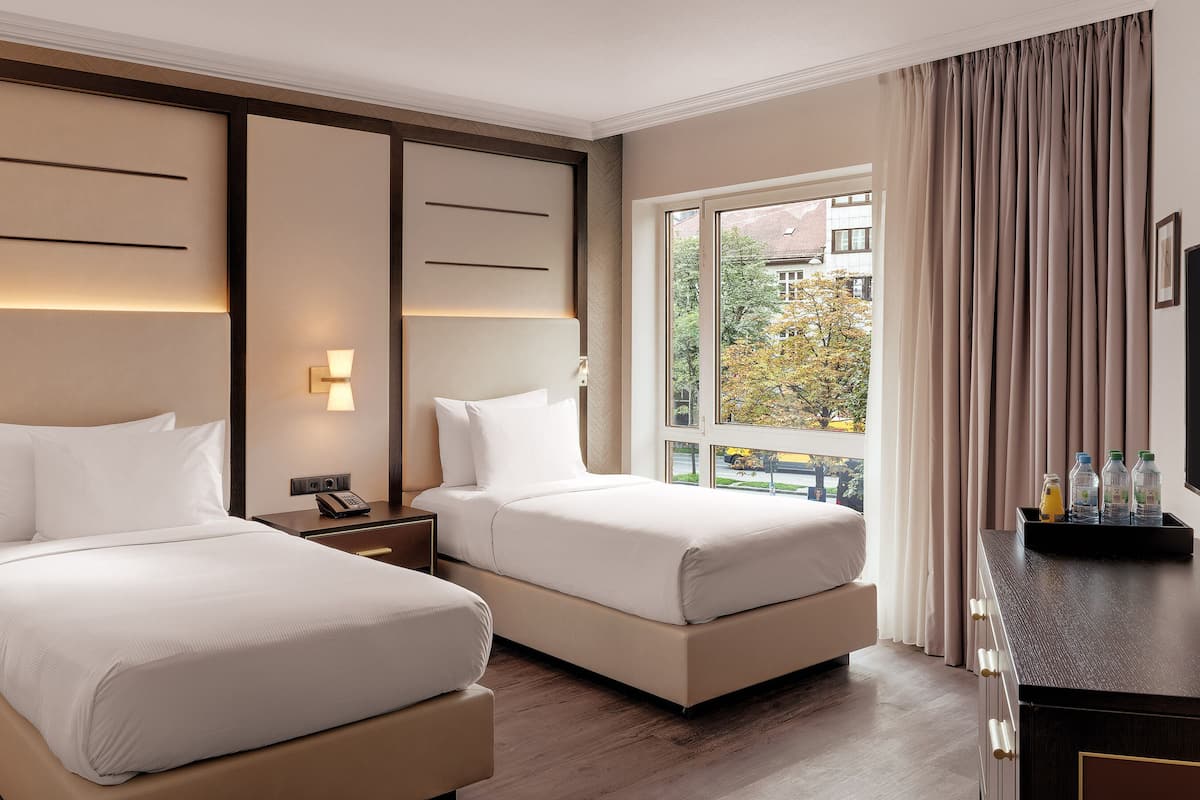 Hypo-allergenic bedding, in-room safe, laptop workspace, blackout drapes