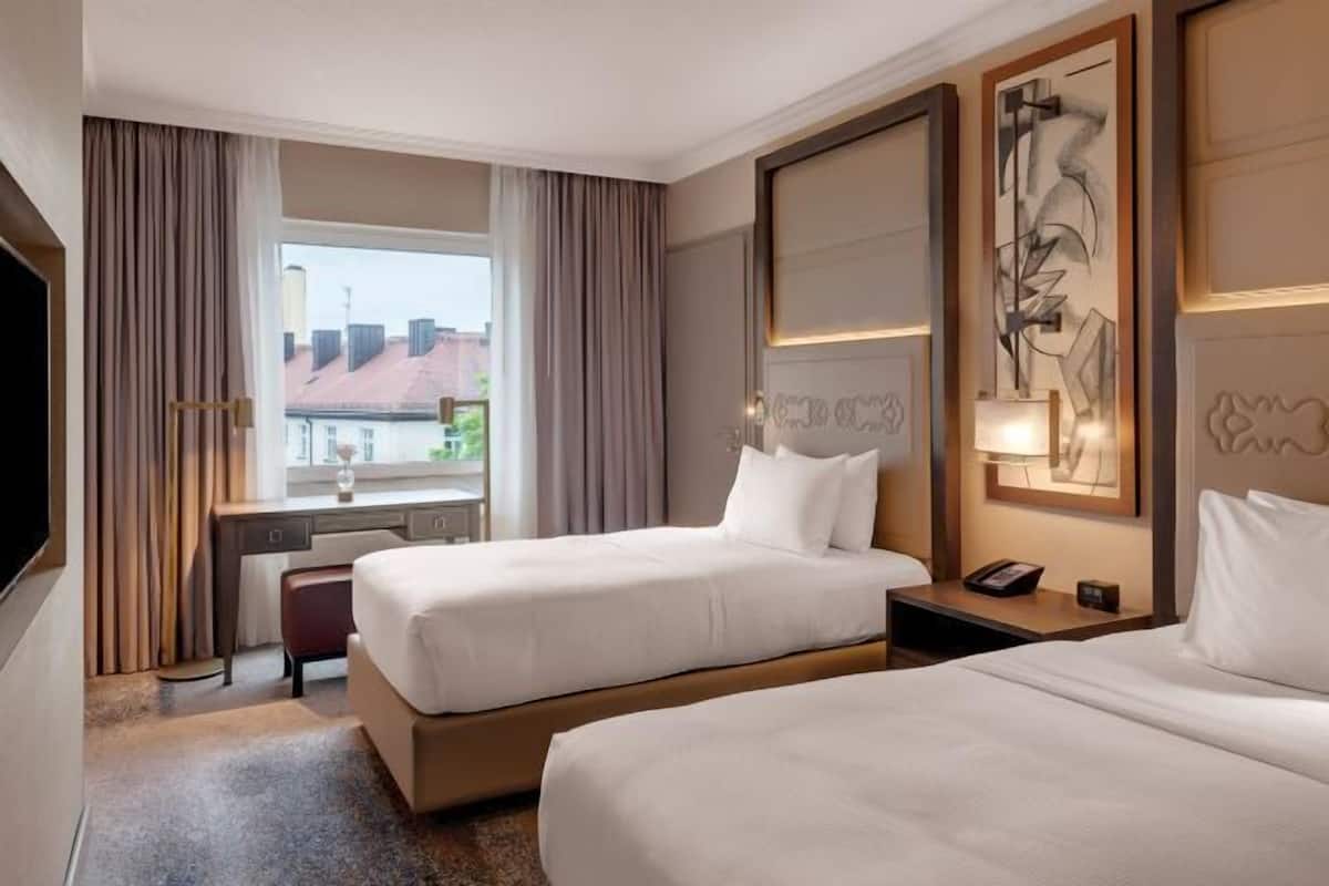 Hypoallergeen beddengoed, een kluis op de kamer, een laptopwerkplek