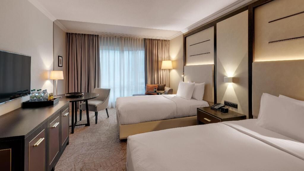 Hypo-allergenic bedding, in-room safe, laptop workspace