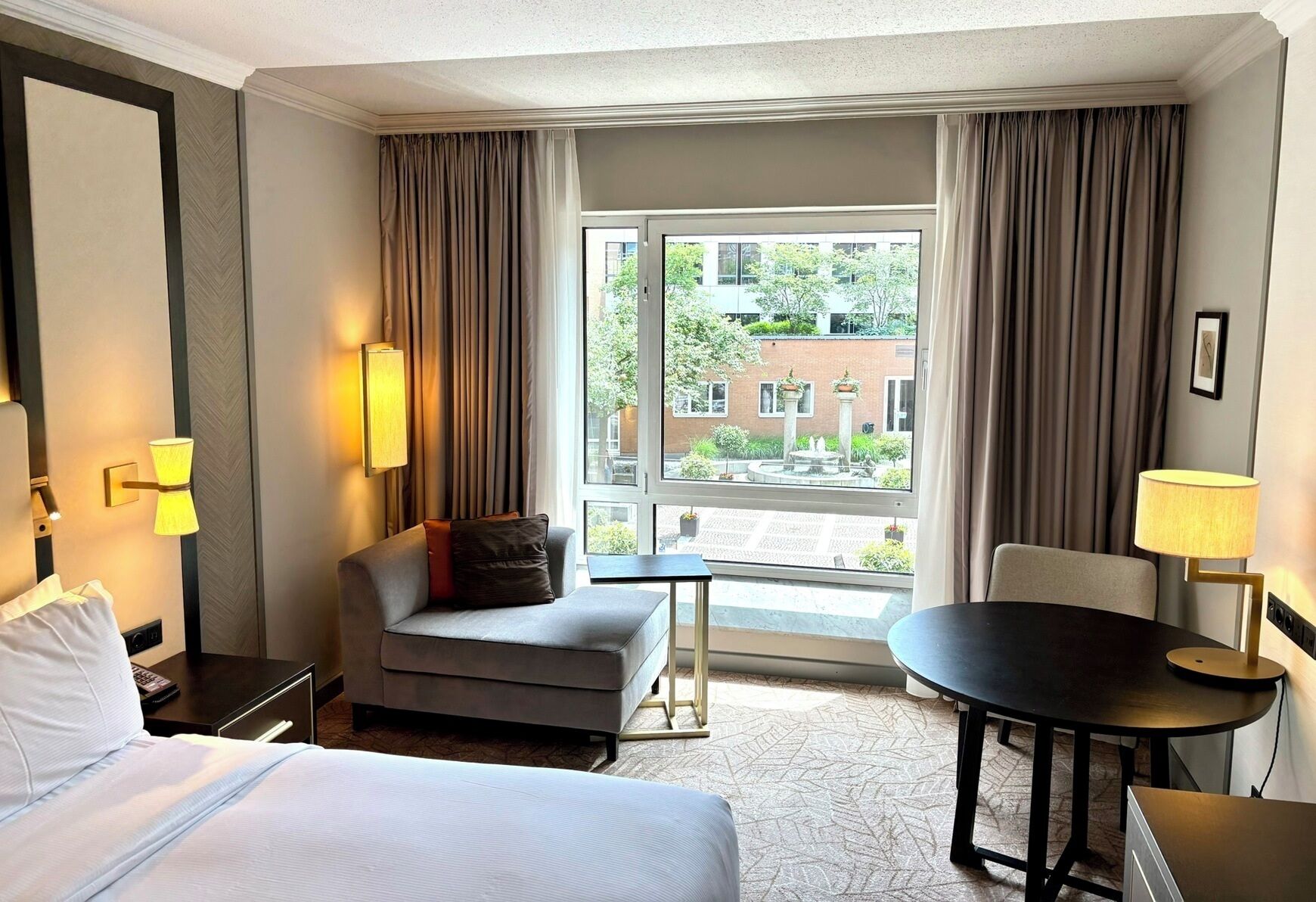 Hypo-allergenic bedding, in-room safe, laptop workspace