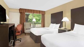 Desk, blackout drapes, iron/ironing board, free cribs/infant beds