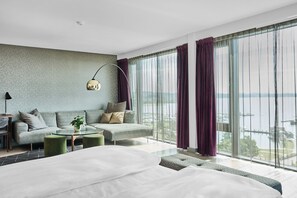 Suite, 1 Bedroom, Ocean View | Living area | 40-inch Smart TV with cable channels, TV, streaming services