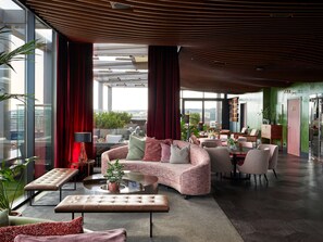 2 bars/lounges, piano bar, pub, rooftop bar