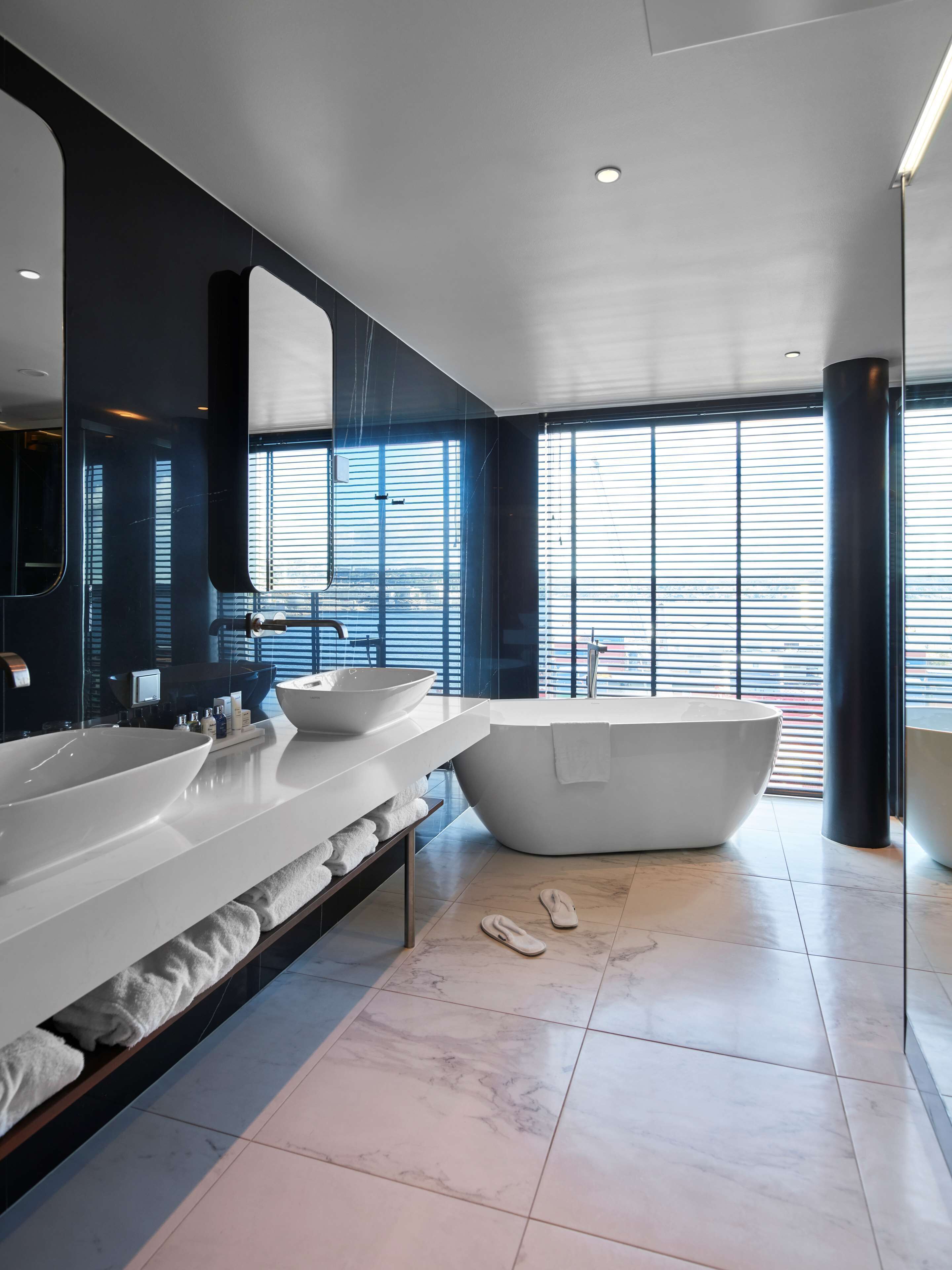 suite, 1 bedroom, ocean view | bathroom | shower, rainfall showerhead, hair dryer, towels