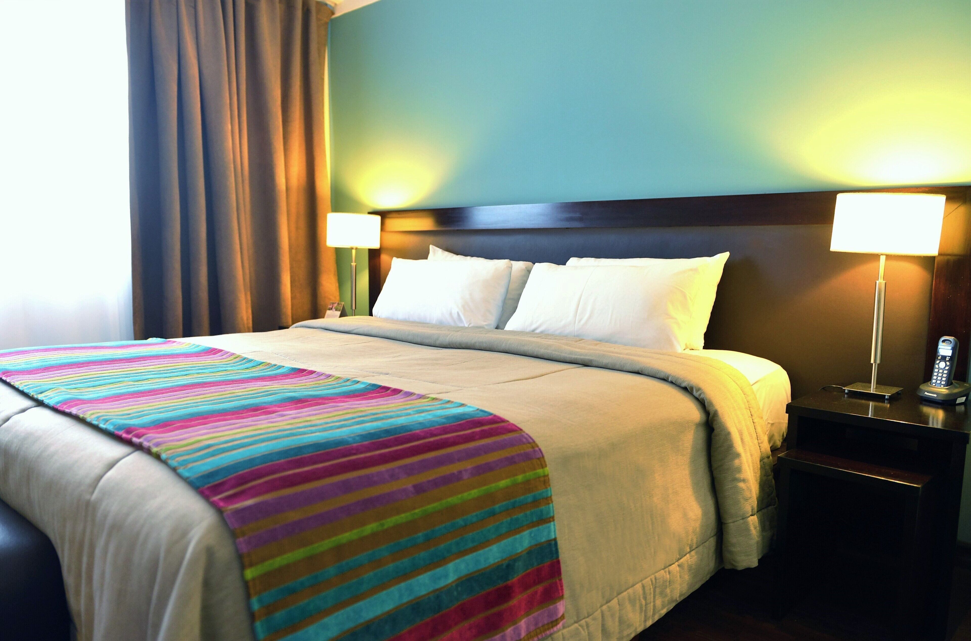 Premium bedding, down comforters, minibar, in-room safe