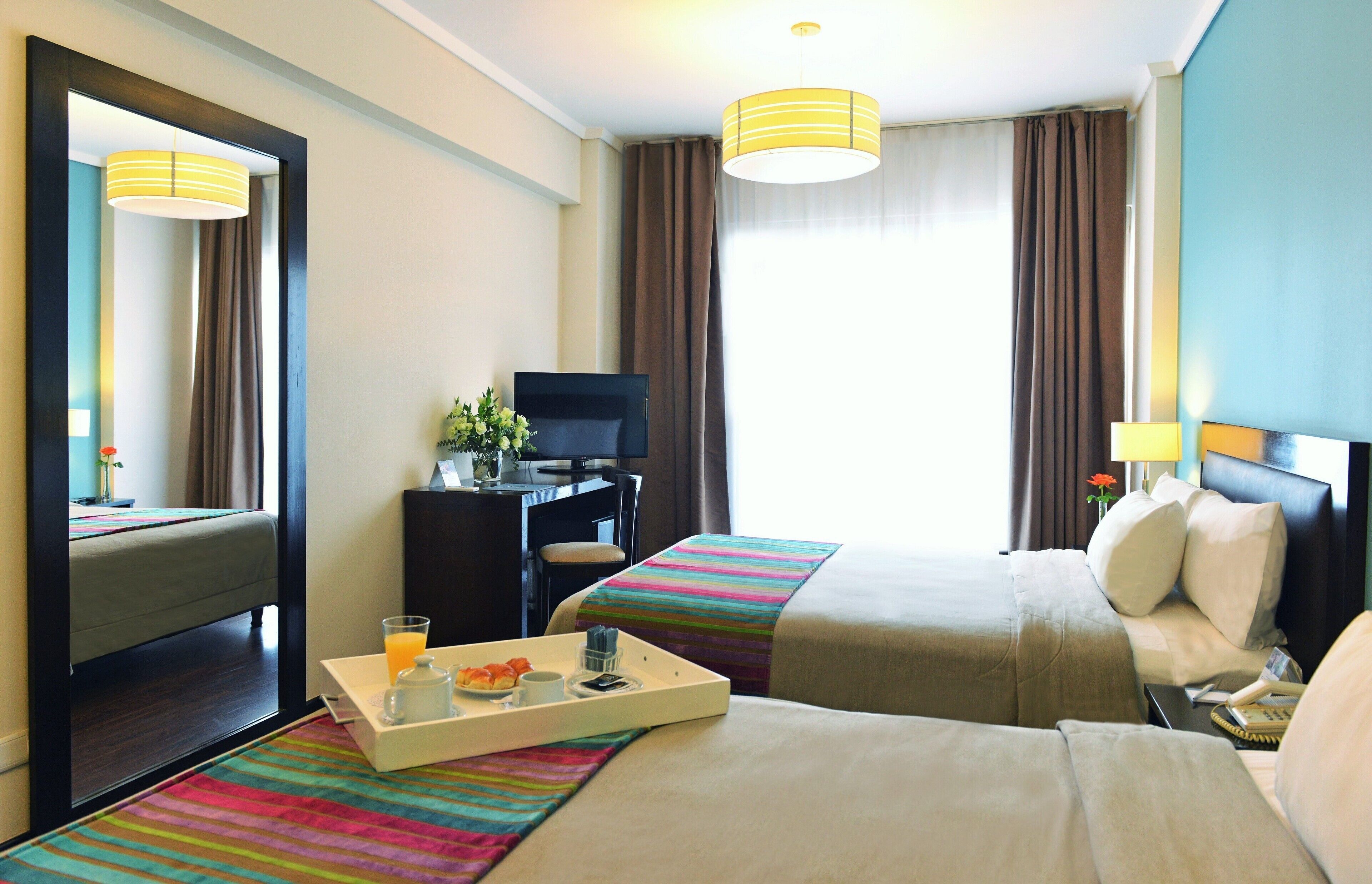 Premium bedding, down comforters, minibar, in-room safe