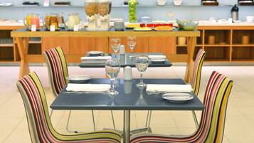 Daily buffet breakfast (USD 12 per person)