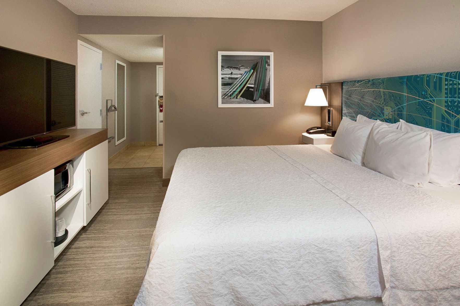 Premium bedding, down comforters, pillowtop beds, in-room safe