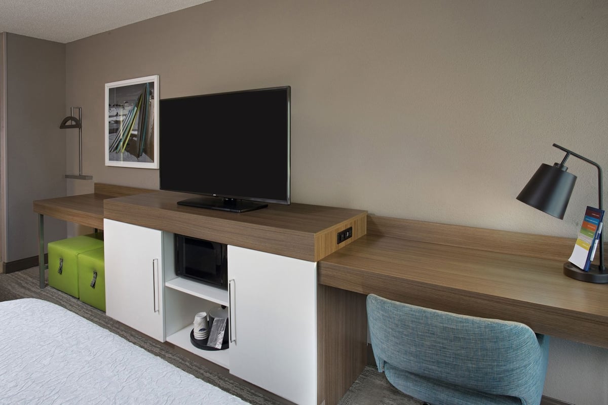 Premium bedding, down comforters, pillowtop beds, in-room safe