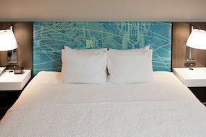 Premium bedding, down comforters, pillowtop beds, in-room safe