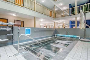 Indoor pool, seasonal outdoor pool, pool umbrellas, sun loungers