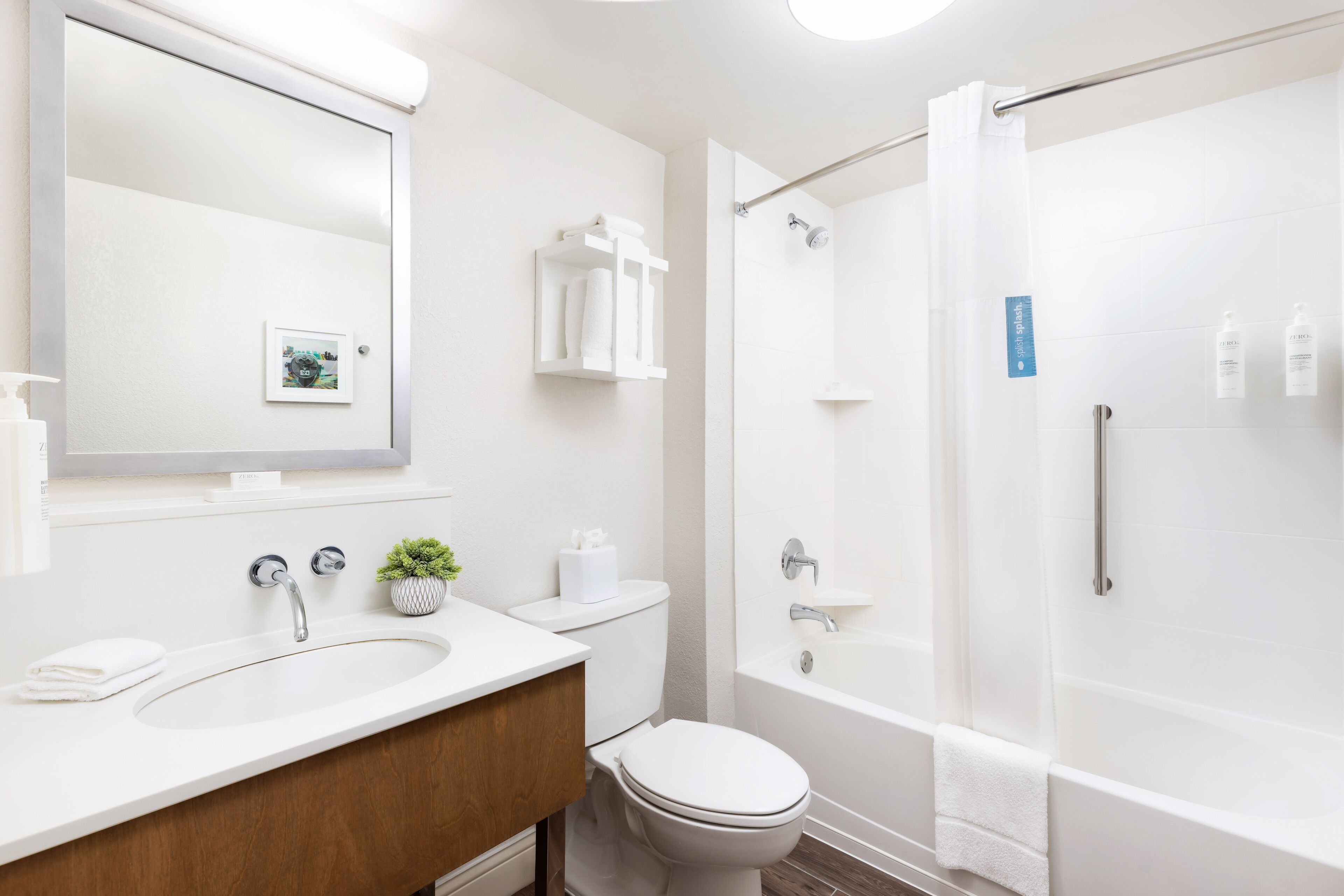 combined shower/bathtub, free toiletries, hair dryer, towels