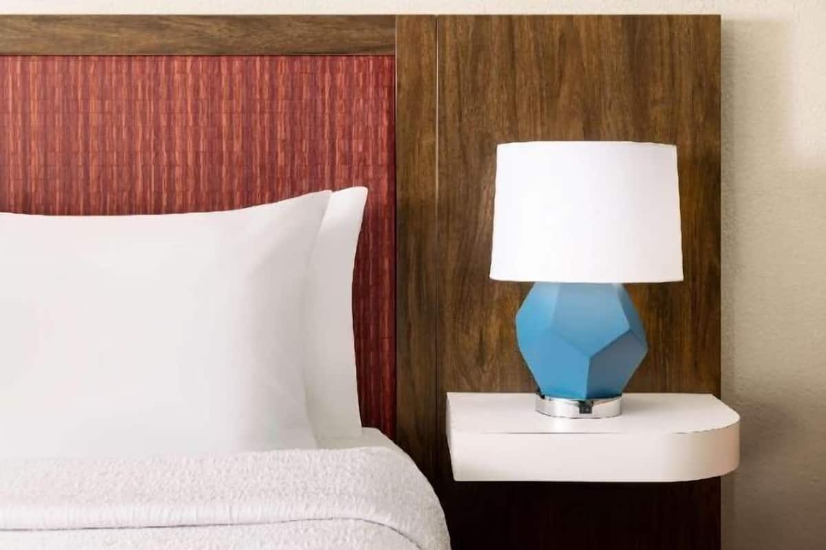 Premium bedding, blackout curtains, iron/ironing board, free WiFi