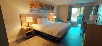 Premium bedding, desk, laptop workspace, iron/ironing board