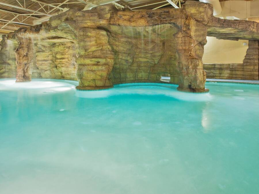 Indoor pool, 3 outdoor pools, open 8:00 AM to 10:00 PM, pool umbrellas