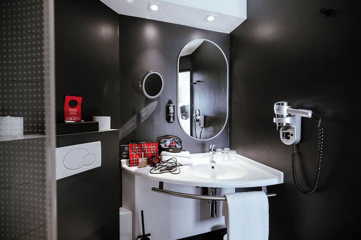 shower, eco-friendly toiletries, hair dryer, towels