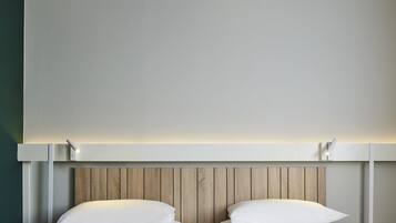 Habitación, 2 camas individuales | Ropa de cama de alta calidad y caja de seguridad en la habitación