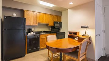 Fridge, microwave, coffee/tea maker, dining tables