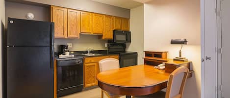 Fridge, microwave, coffee/tea maker, dining tables