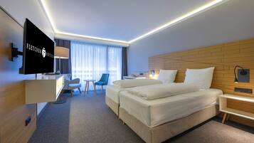 Habitación doble superior | Ropa de cama hipoalergénica y caja de seguridad en la habitación