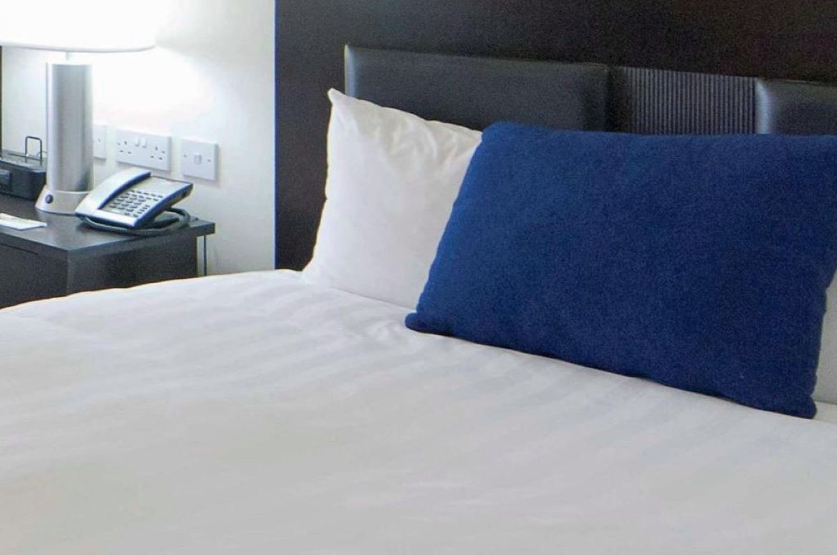 Down comforters, pillowtop beds, in-room safe, desk