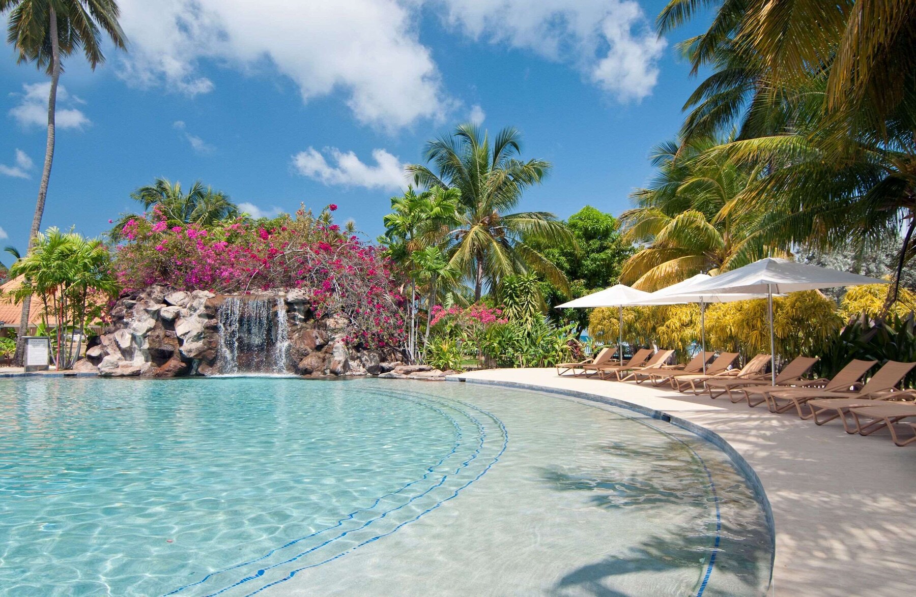 2 outdoor pools, open 10:00 AM to 10 PM, pool umbrellas, pool loungers